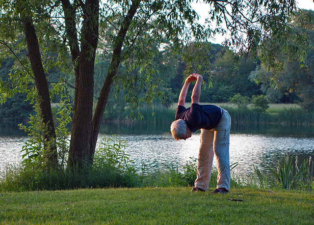 doing yoga in a field