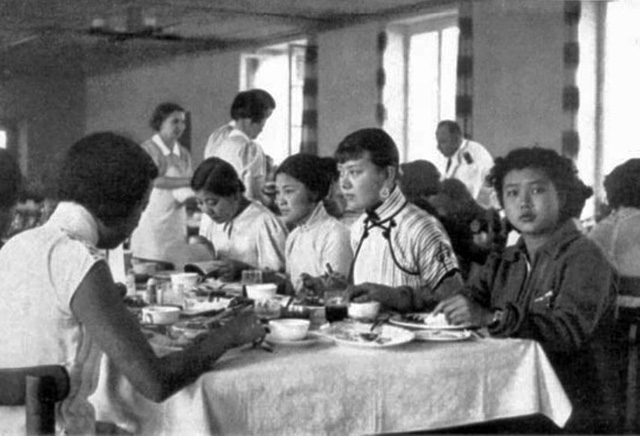Athletes enjoying a meal at the Olympic Village food hall