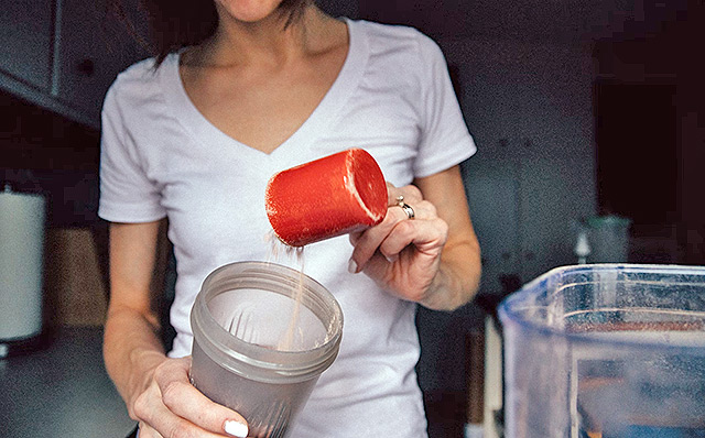 drinking a protein shake