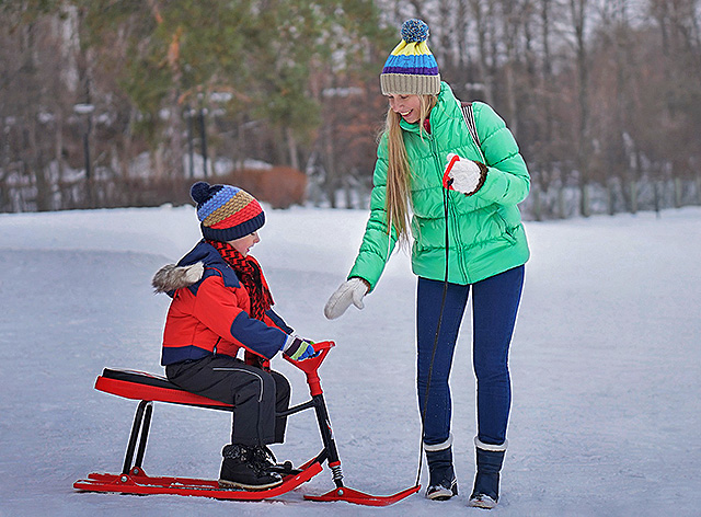 kid on a skibob