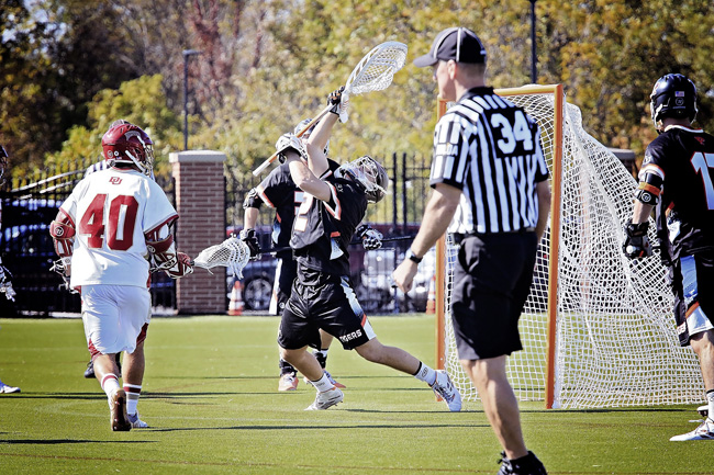 lacrosse match in action
