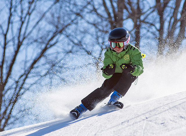downhill skiing with goggles