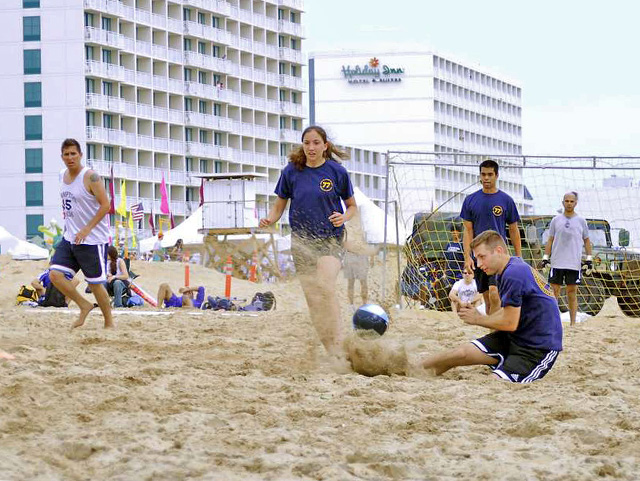a casual beach football game