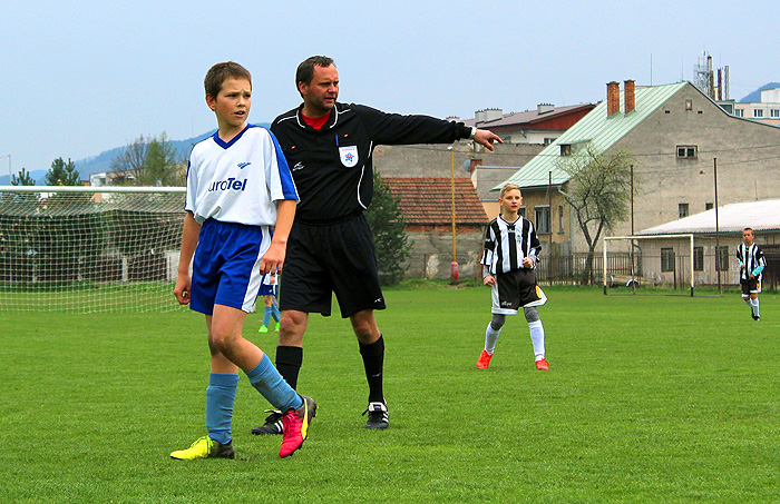 Football referee running during a match