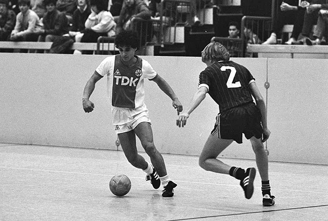 indoor soccer with a wall for the sideline