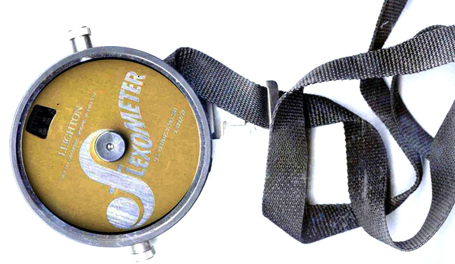 Leighton flexometer showing dial and strap attachment for measuring joint range of motion