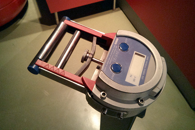 handgrip dynamometer being used for grip strength testing