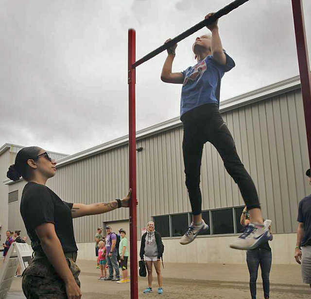 Marine performing pull-up test